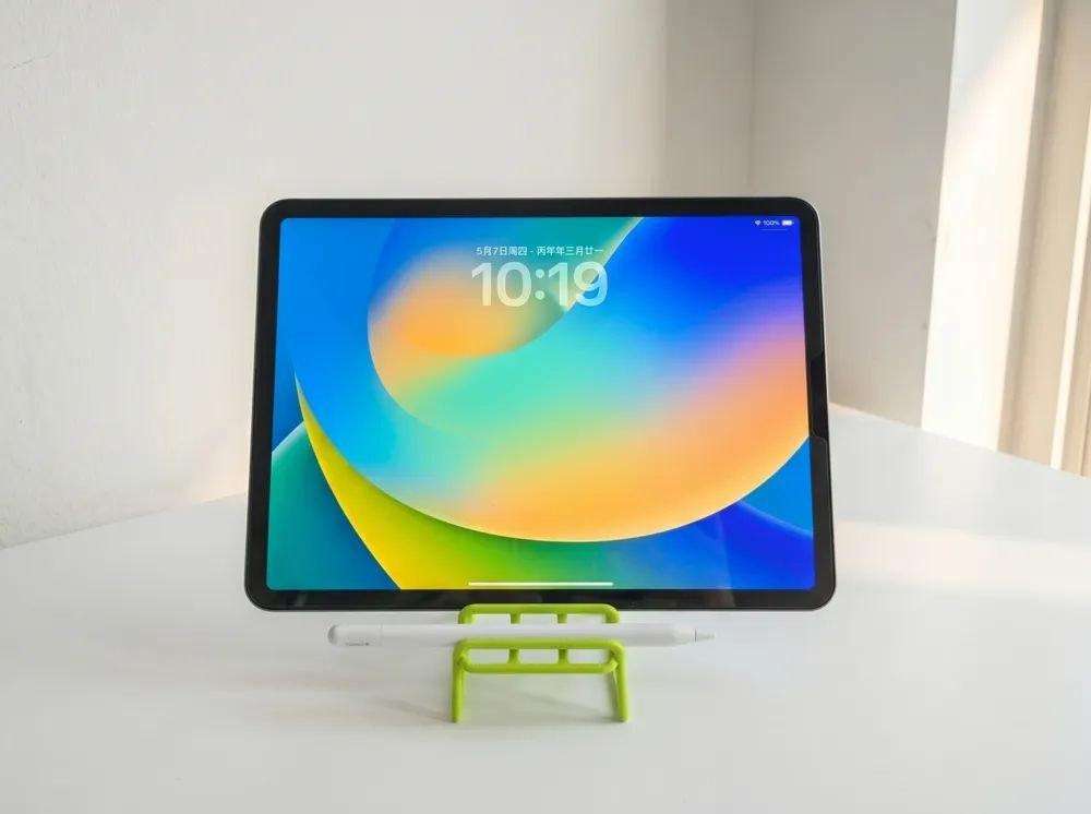 A phone stand in the form of a chair.