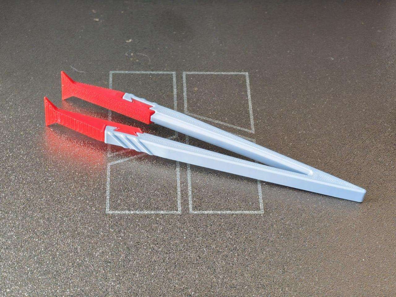 Tweezers with replaceable tips for precise work.